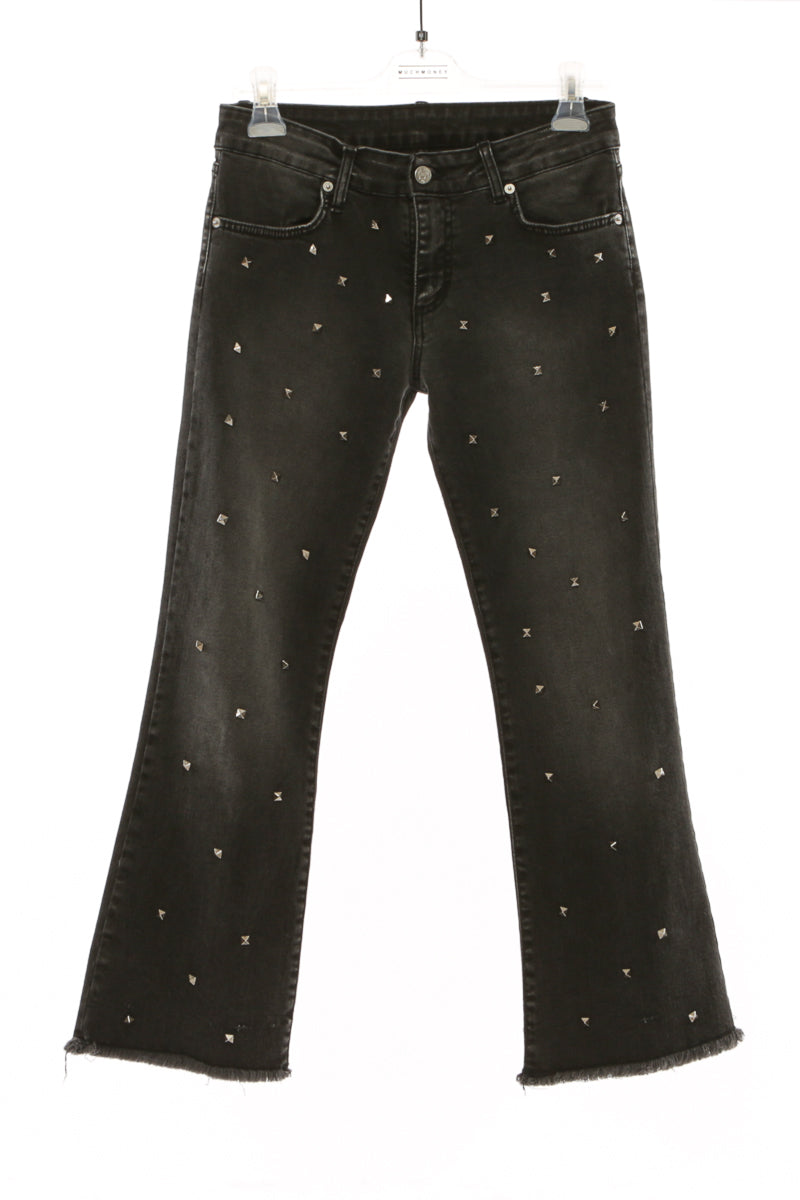 pantalone denim  nero trombetta con borchie