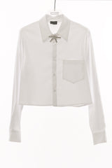 camicia tasca e spilla