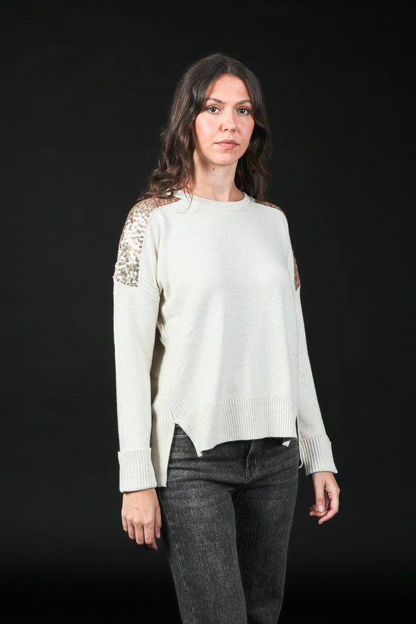 maglia over con paillettes spalle