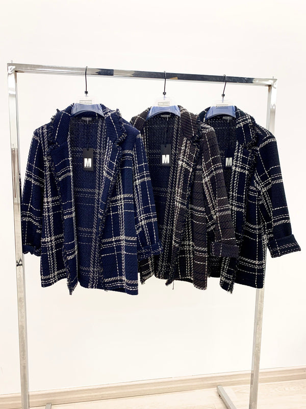 giacca tweed media