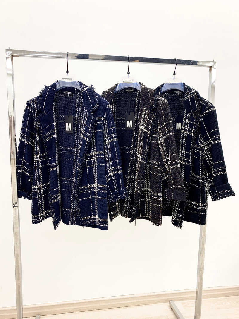 giacca tweed media