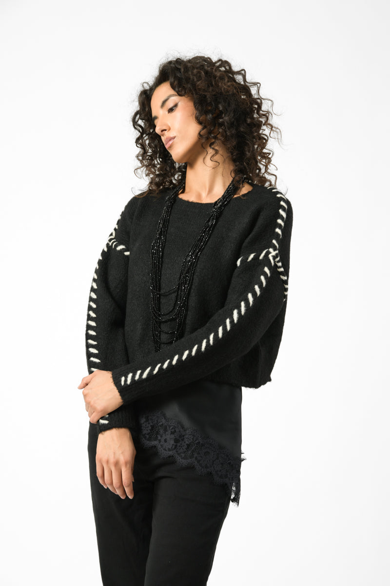 maglia cuciture a contrasto