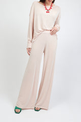 pantalone palazzo fluido lucido