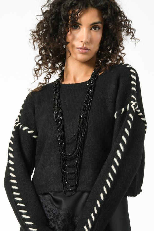 maglia cuciture a contrasto