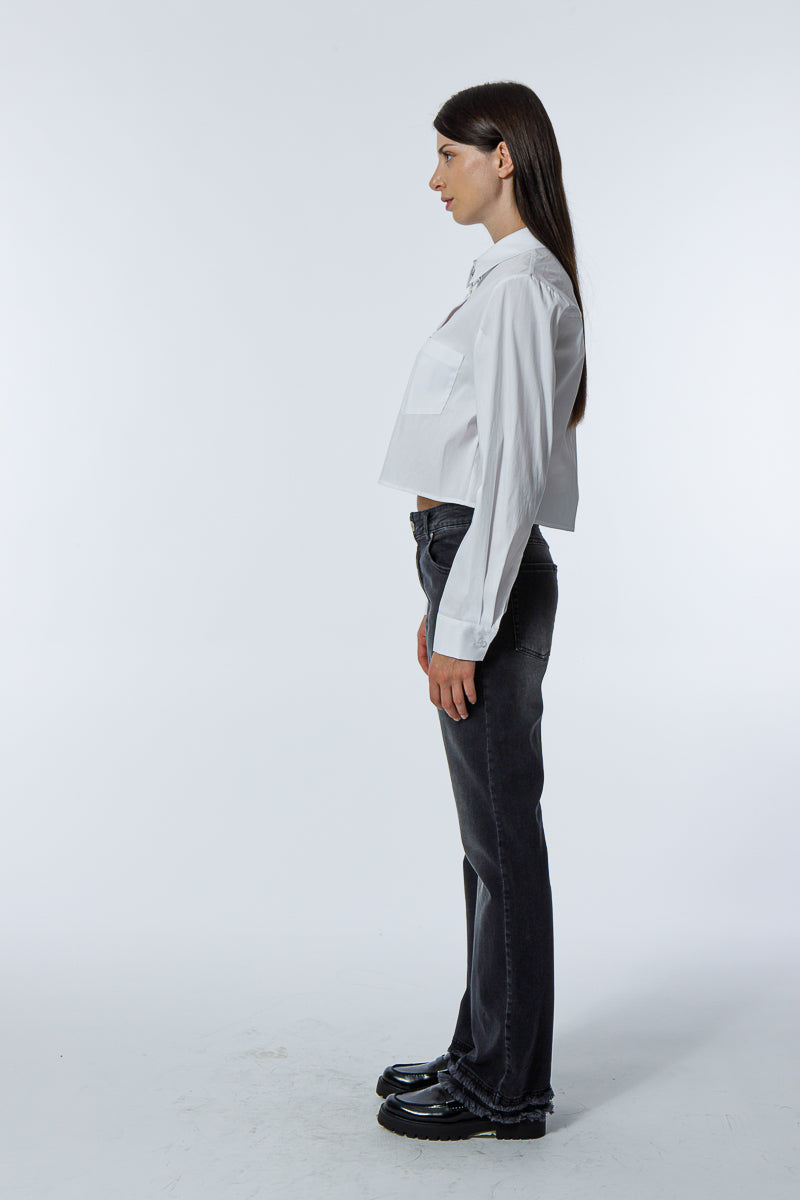 pantalone denim zampa frangetta
