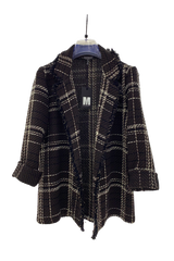 giacca tweed media