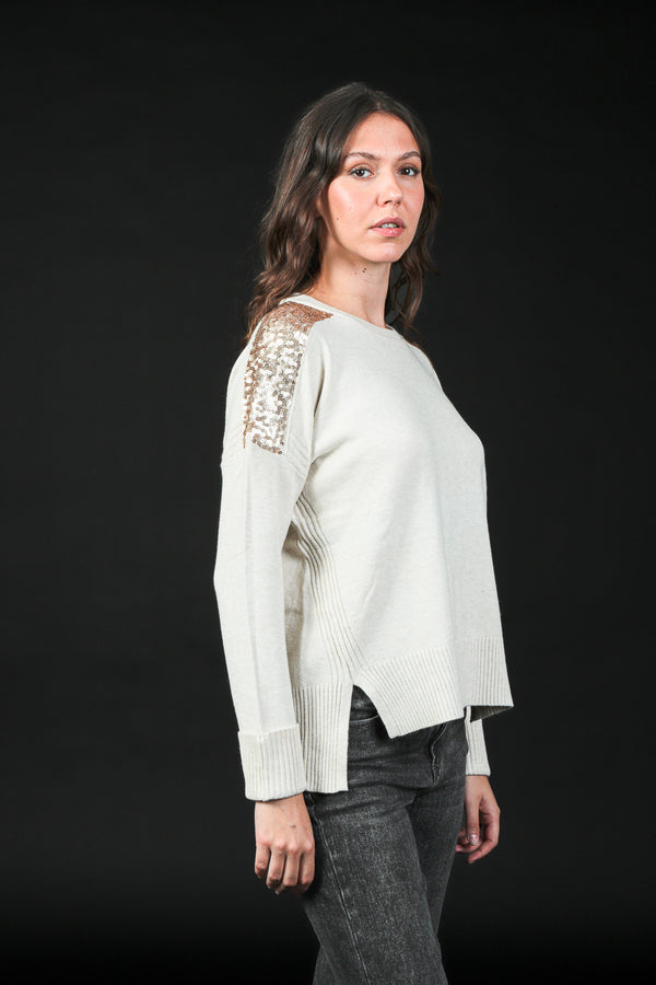 maglia over con paillettes spalle