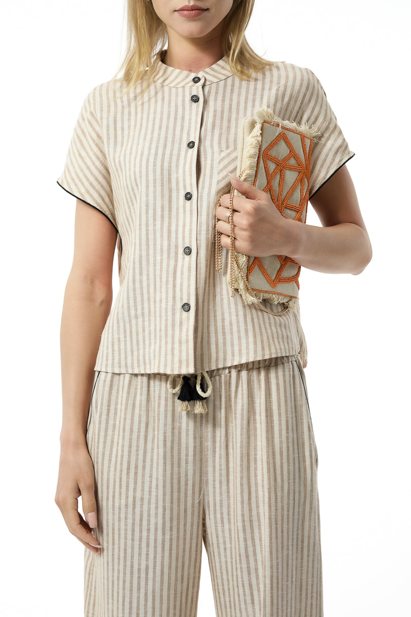 blusa riga con profilo